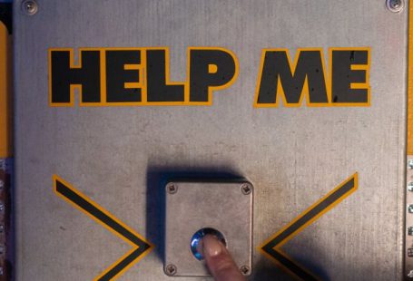 Indoor Spaces - Person Pushing A Control Button