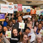 Charity Event - A large group of people cheering at charity event