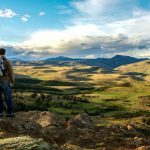 Solo Trekking - Man Walking Across Rio Turbio in Patagonia