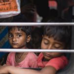 Sleep Quality - Two children look out of a train window