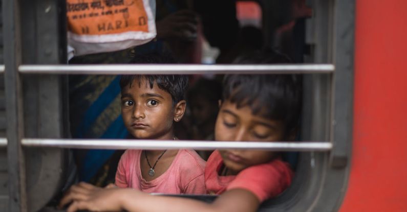 Sleep Quality - Two children look out of a train window