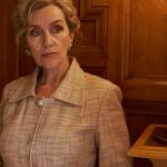 Living Spaces - Elegant Senior Woman Standing by Ornamental Retro Lamp