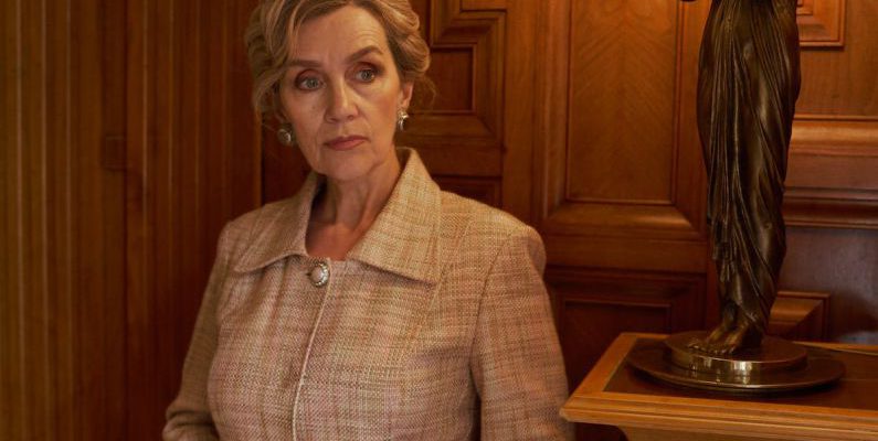 Living Spaces - Elegant Senior Woman Standing by Ornamental Retro Lamp