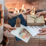Family Reunion - Close-up Shot of People Exchanging Gifts and Cards