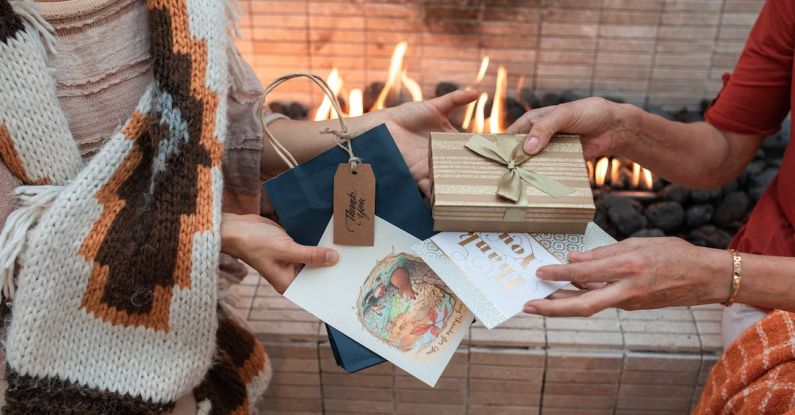 Family Reunion - Close-up Shot of People Exchanging Gifts and Cards