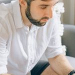 Home Office - A Man Using a Laptop