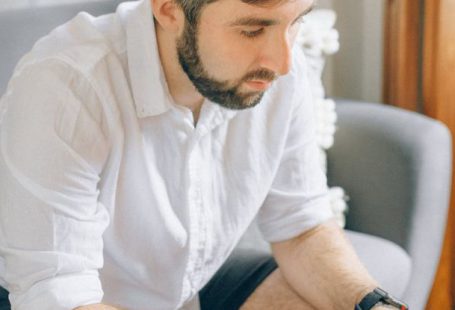 Home Office - A Man Using a Laptop
