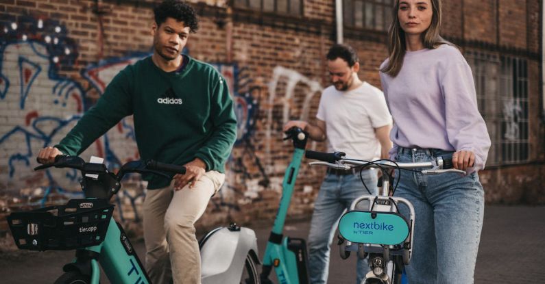 Rented Spaces - Friends on Rented Bikes on a Street