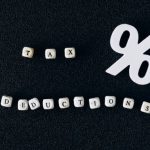Tax Deductions - Tax Deductions Words on Black Surface