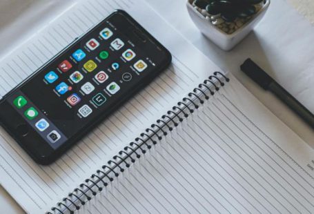 Educational Apps - Space Grey Apple Iphone on Notebook Page